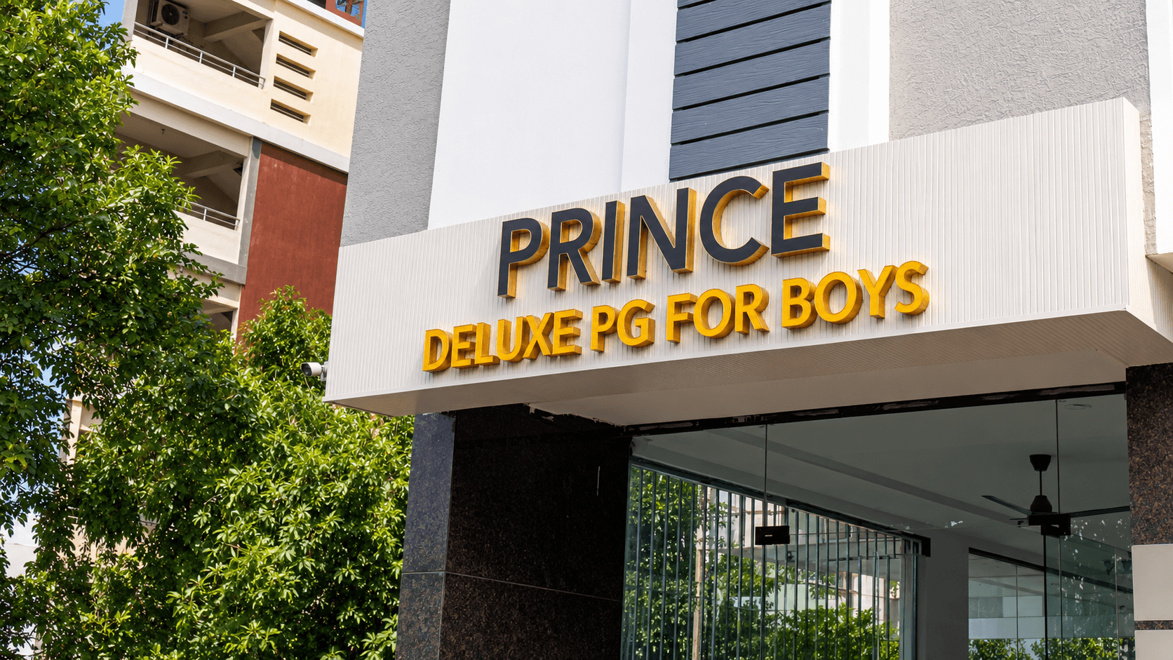 Prince Deluxe PG For Boys building exterior in daylight