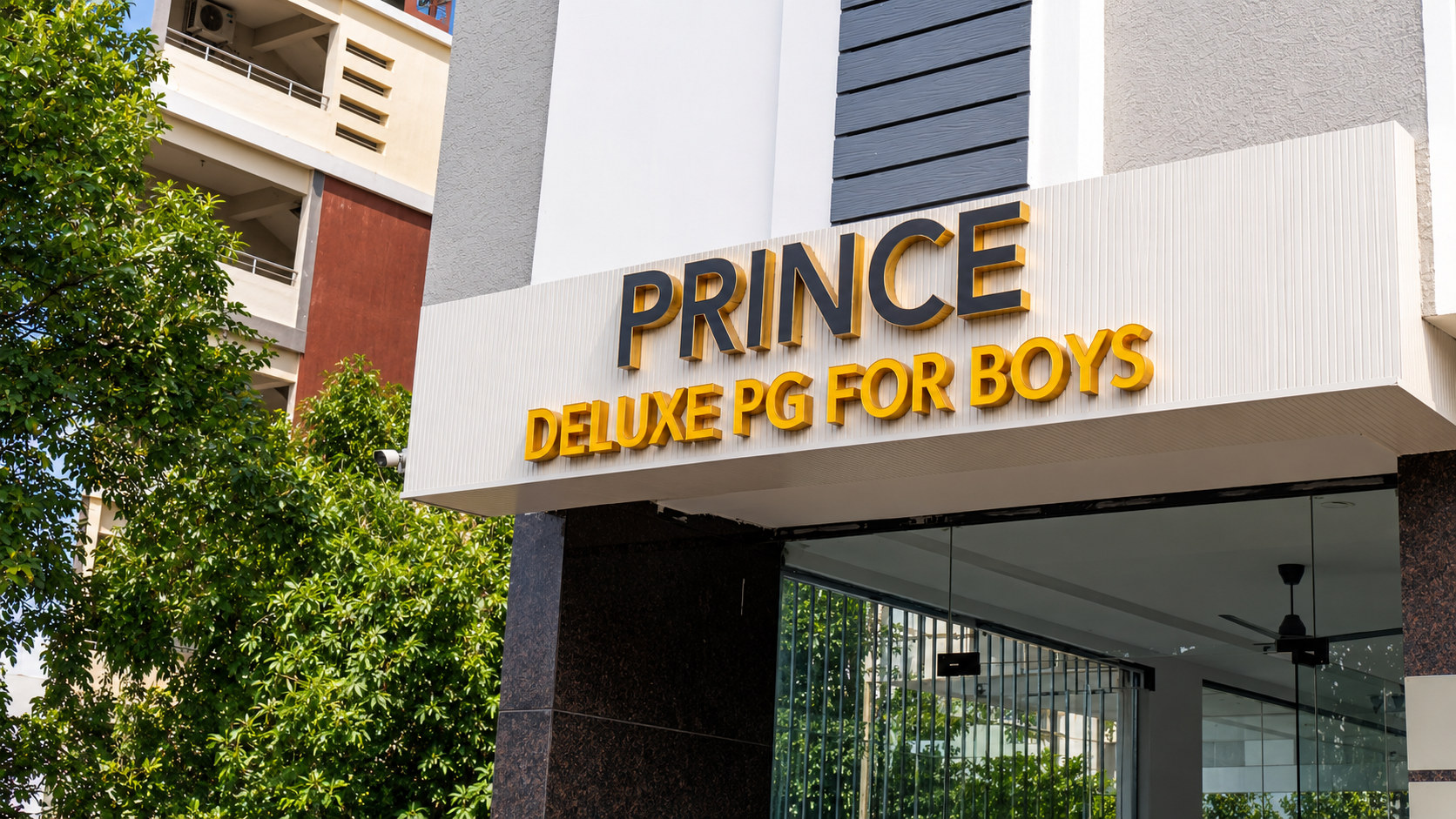 Prince Deluxe PG For Boys building exterior in daylight